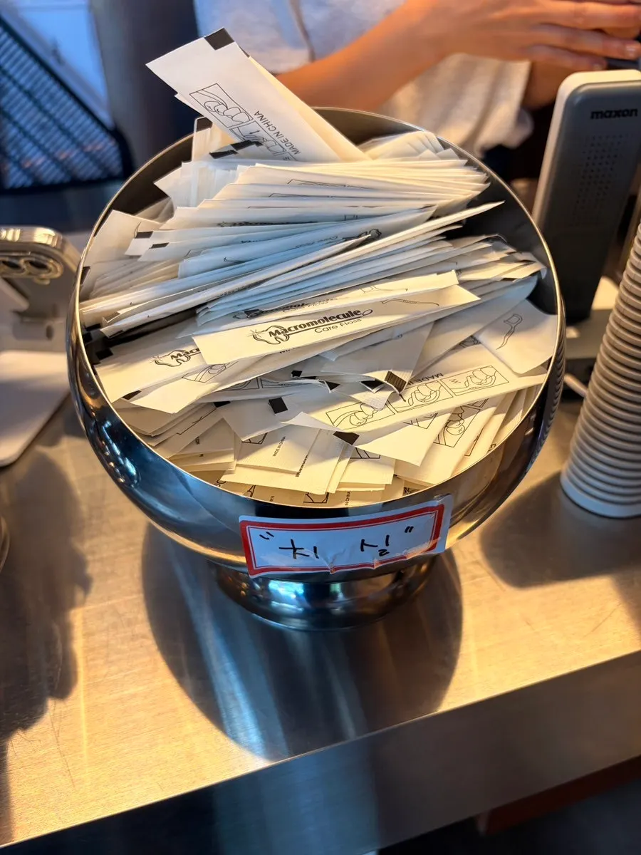 Dental floss set out at the register