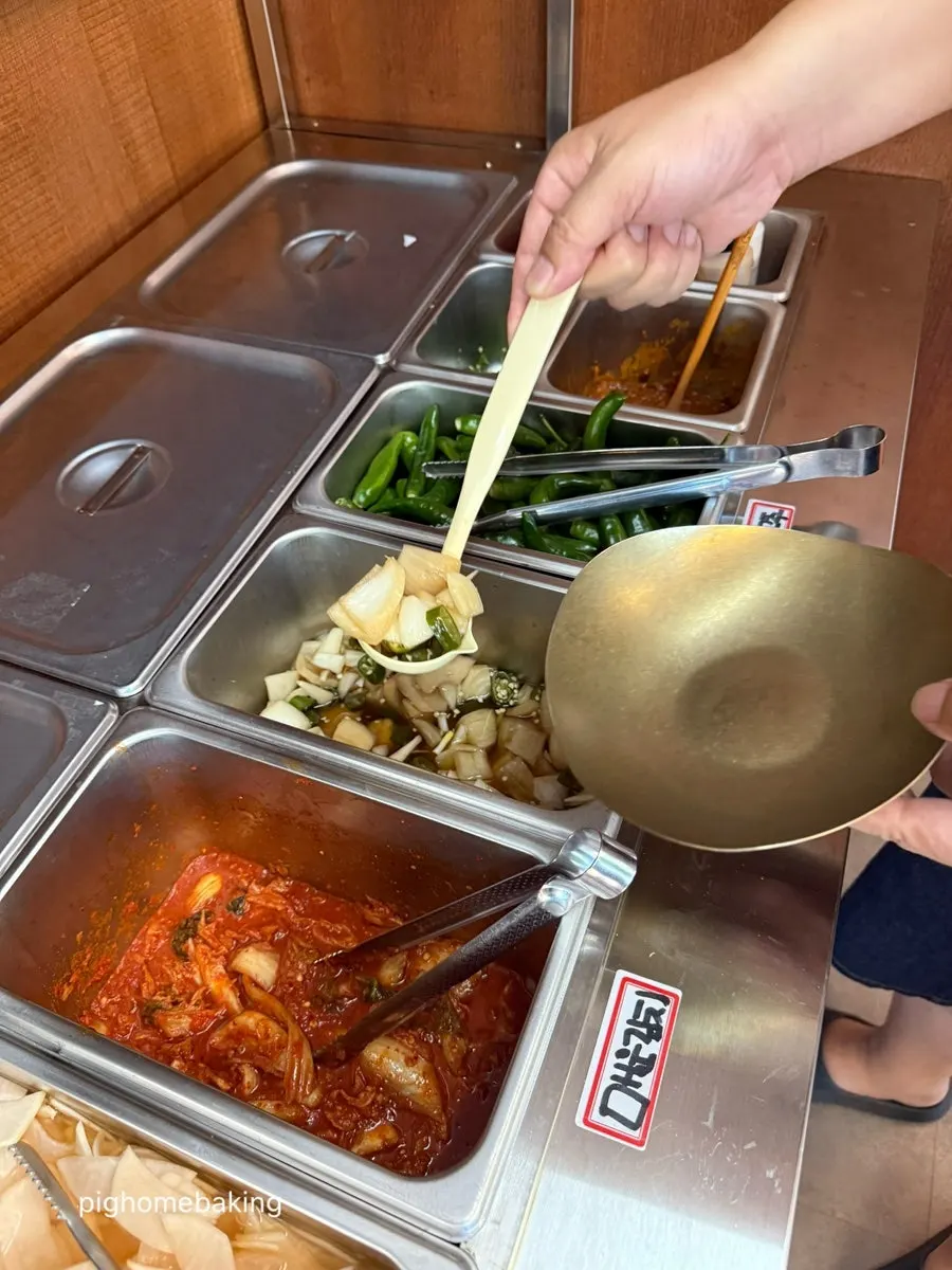 Hot broth and side dish self-serve bar