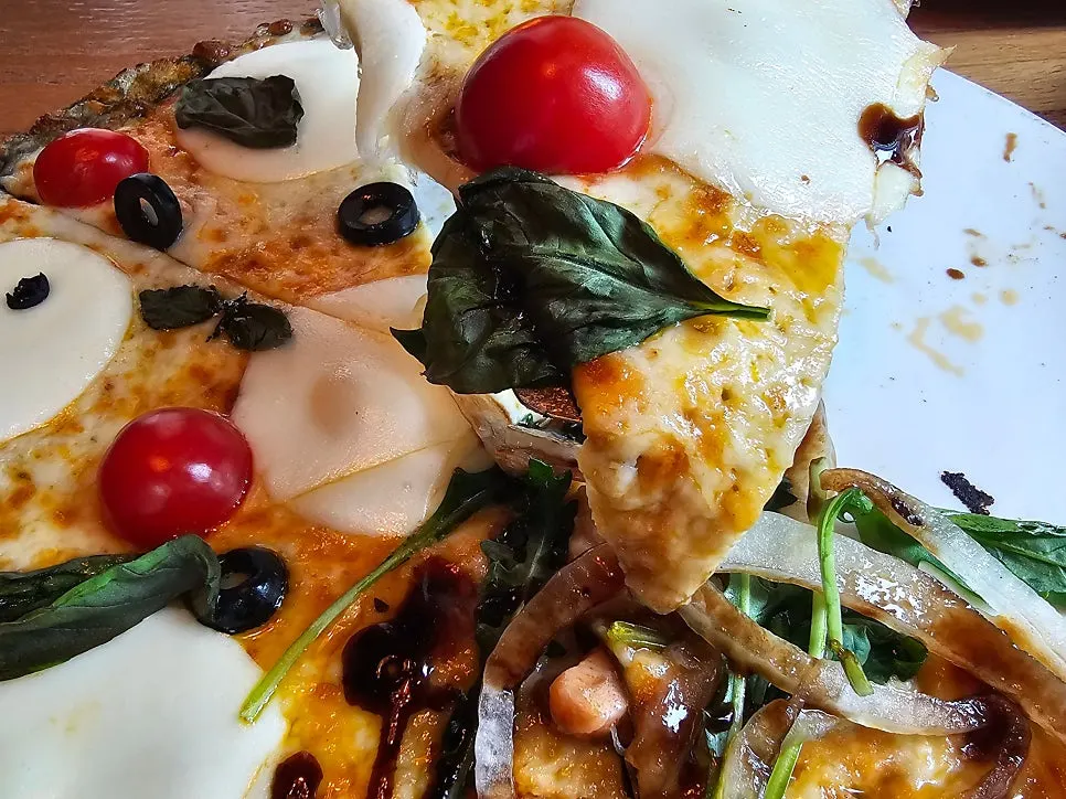 Slice of margherita pizza