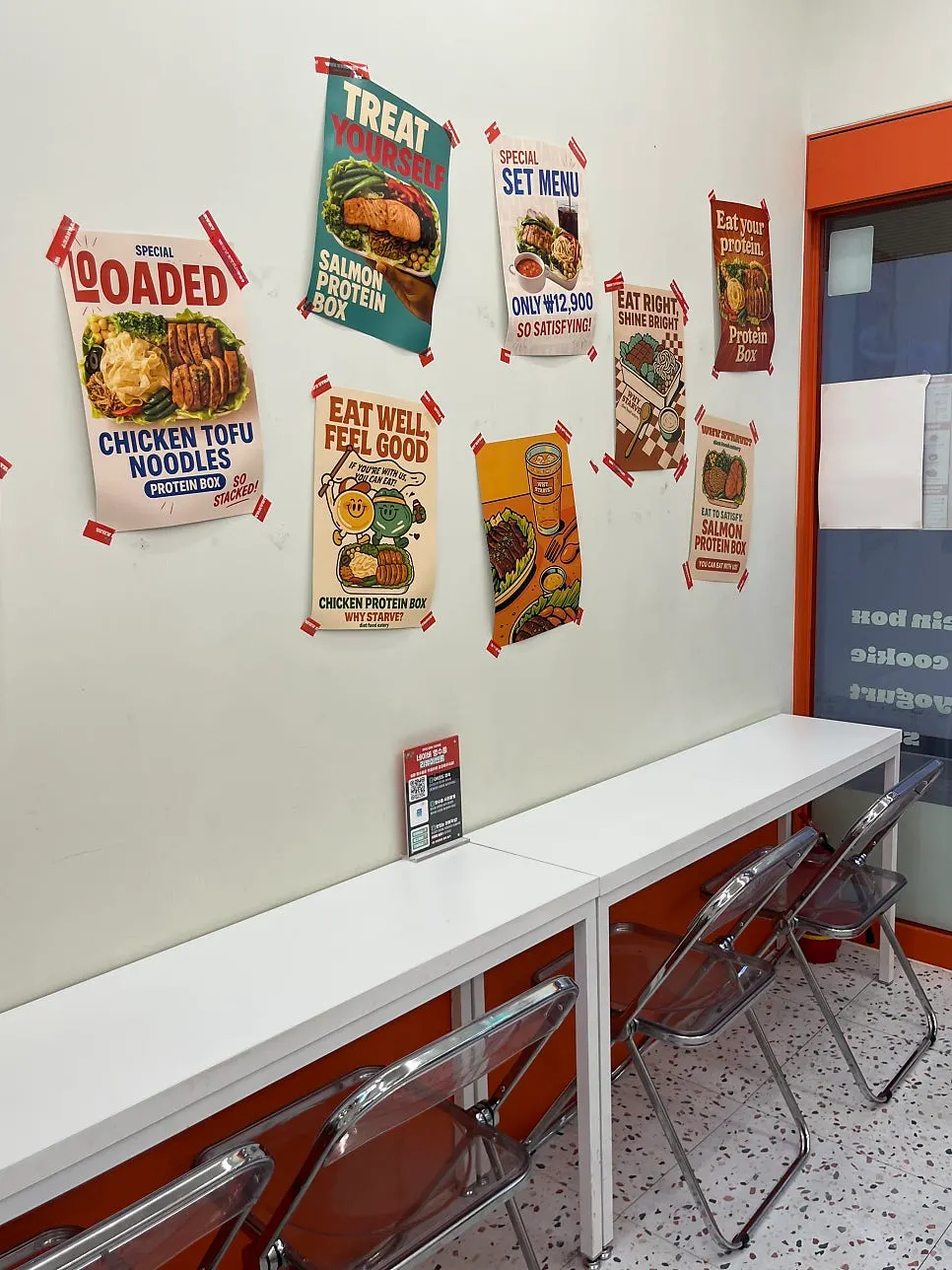 Clean white-toned interior of the salad restaurant