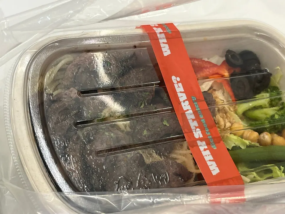 Takeout set with sauces packed alongside