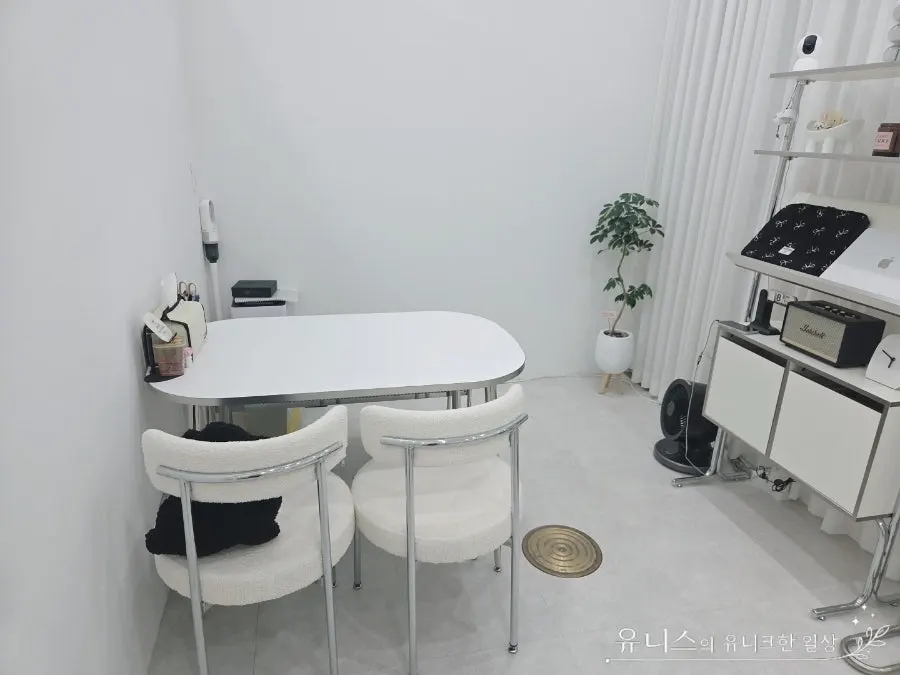 Private treatment space divided by curtains
