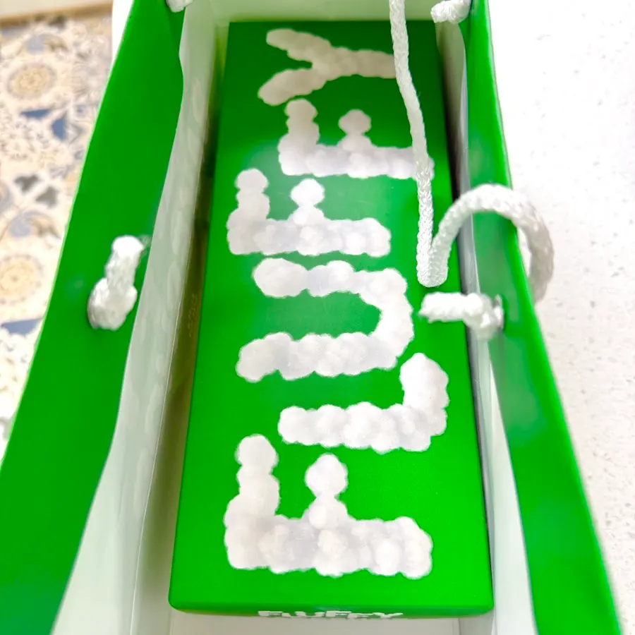 Chuseok gift package in a green shopping bag