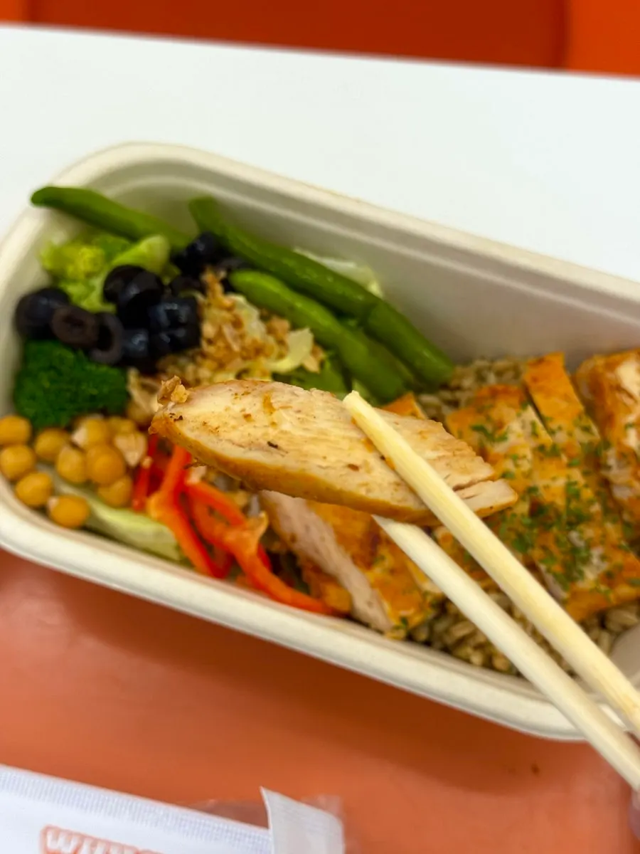 Close-up of chicken breast and oats in the protein box