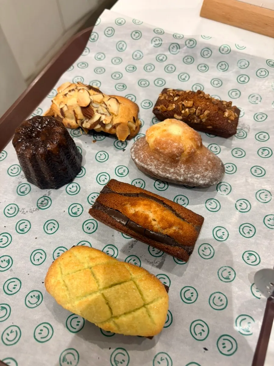A plate of pastries served with coffee