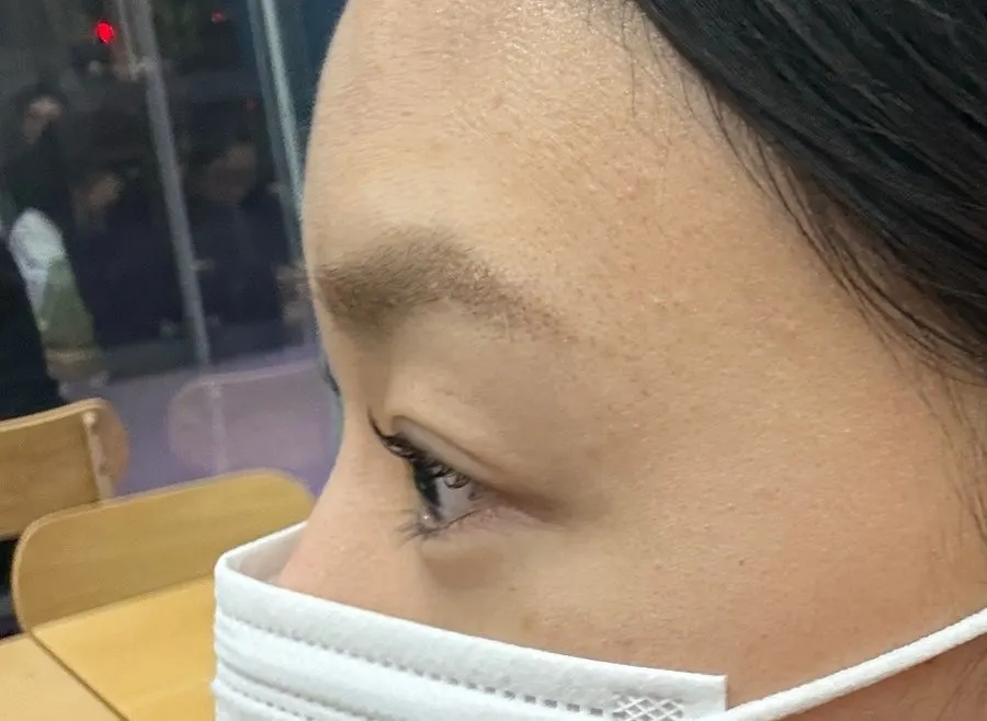 Dark, defined eyes after the perm