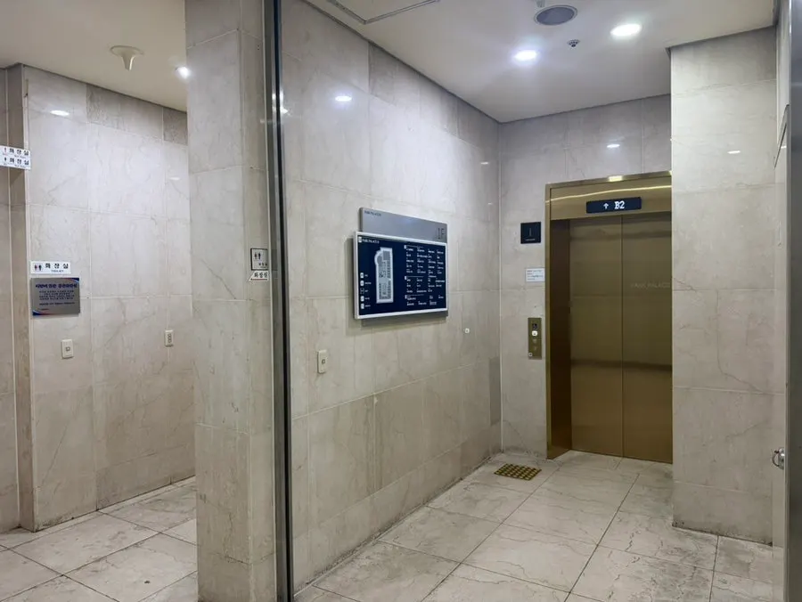 Interior passage near the front desk of the Park Palace 2 building