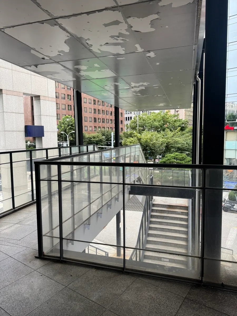 Entrance stairs of the building leading up to Iyo Shop