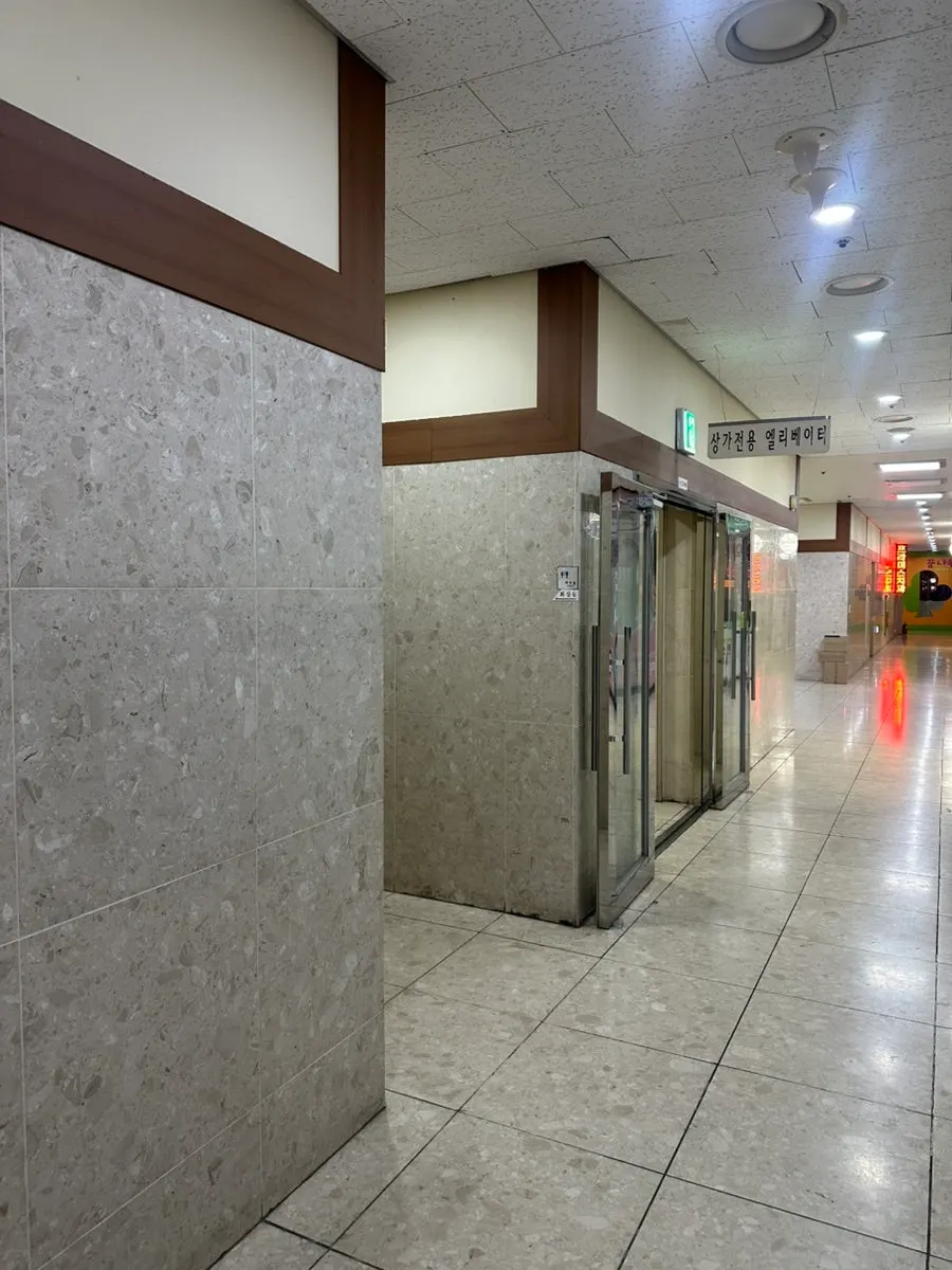 Door to Unit 211, Iyo Shop, on the 2nd floor