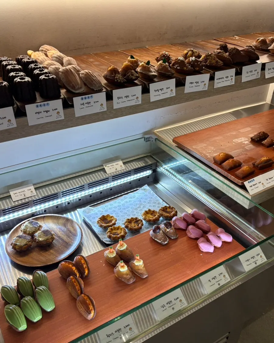 Various pastries displayed at Fluffy Bake Shop in Gongdeok