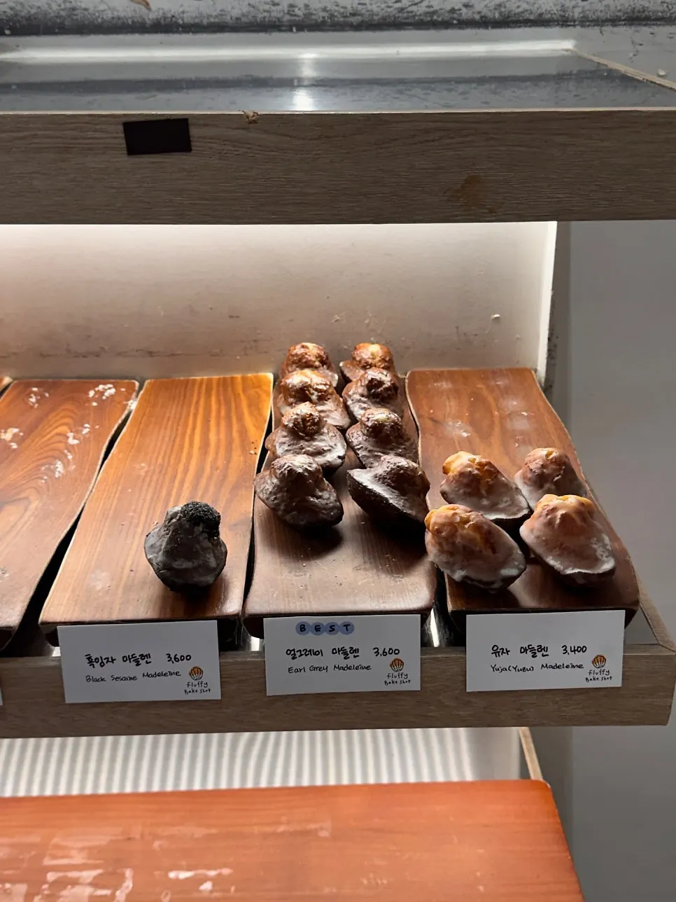 Financiers and madeleines in the display case