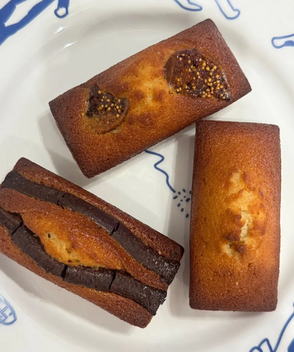 Fig, chocolate, and vanilla financiers on a plate