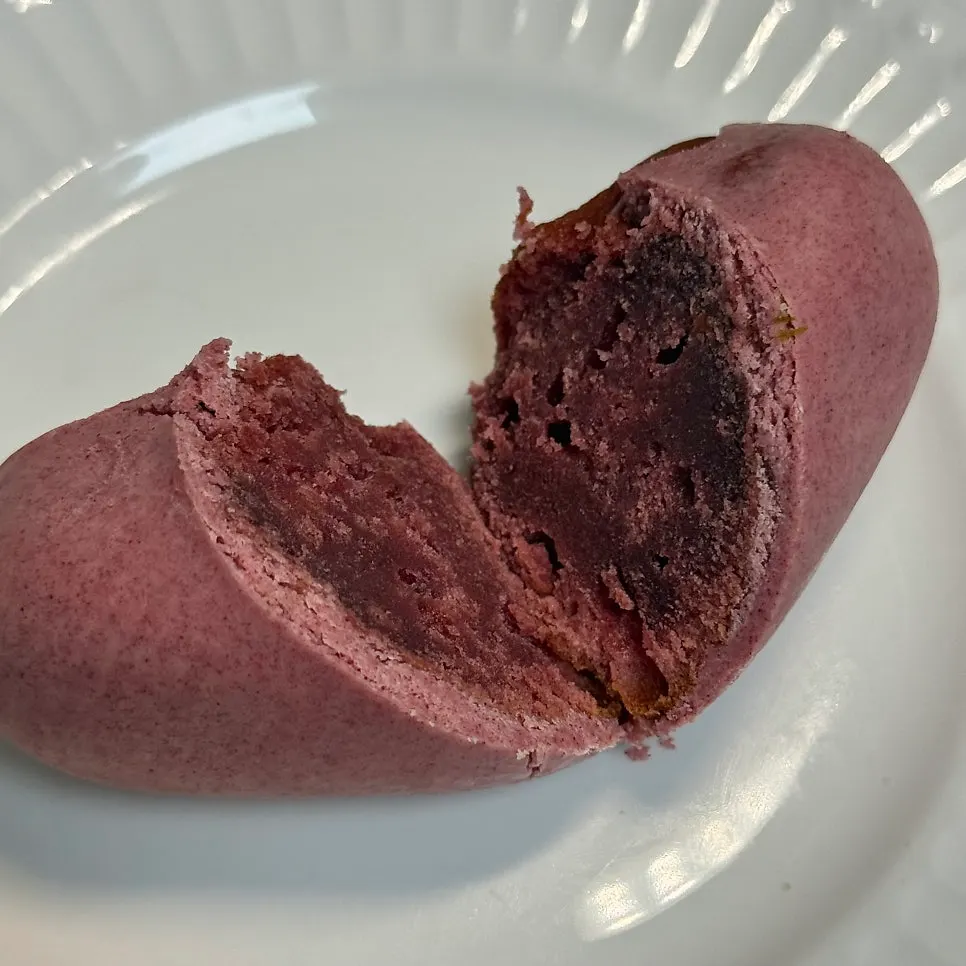 Cross-section of the chestnut madeleine topped with marron glacé