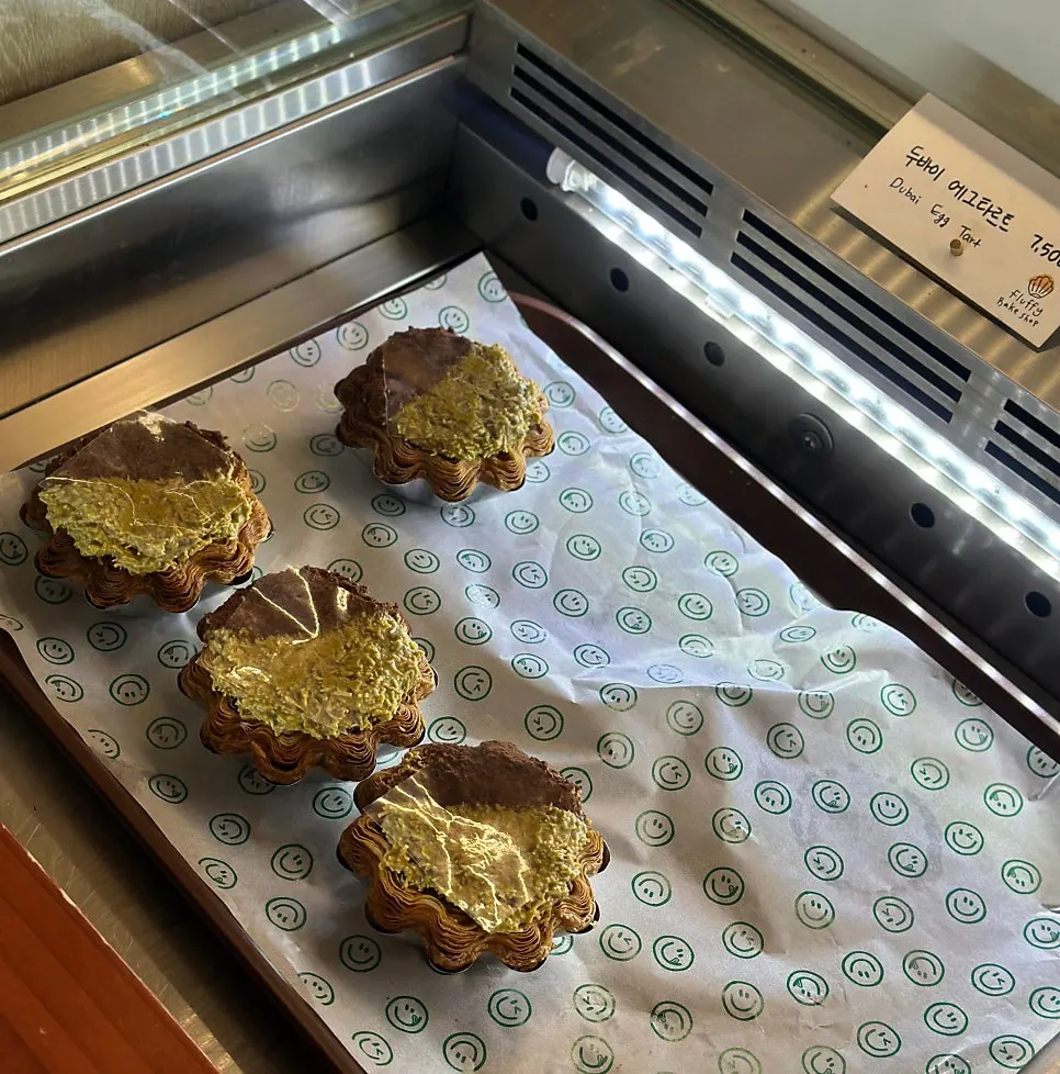 Egg tarts and financiers on display