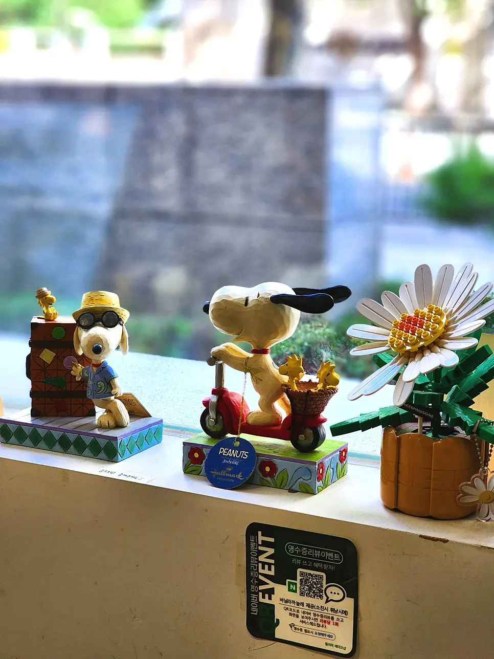 Shop figurines arranged by the window