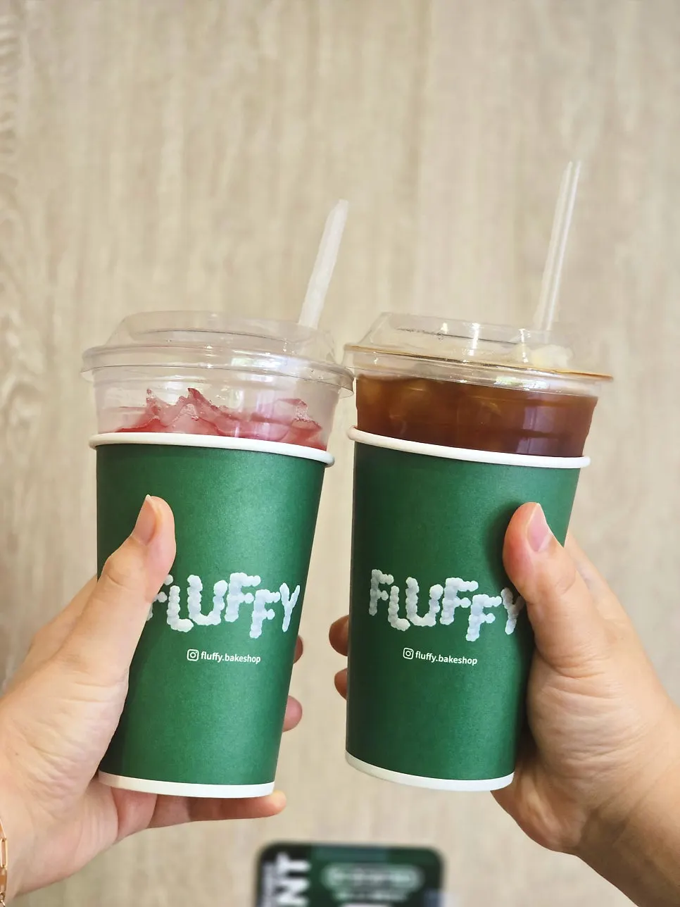 Drinks packaged with green paper cups