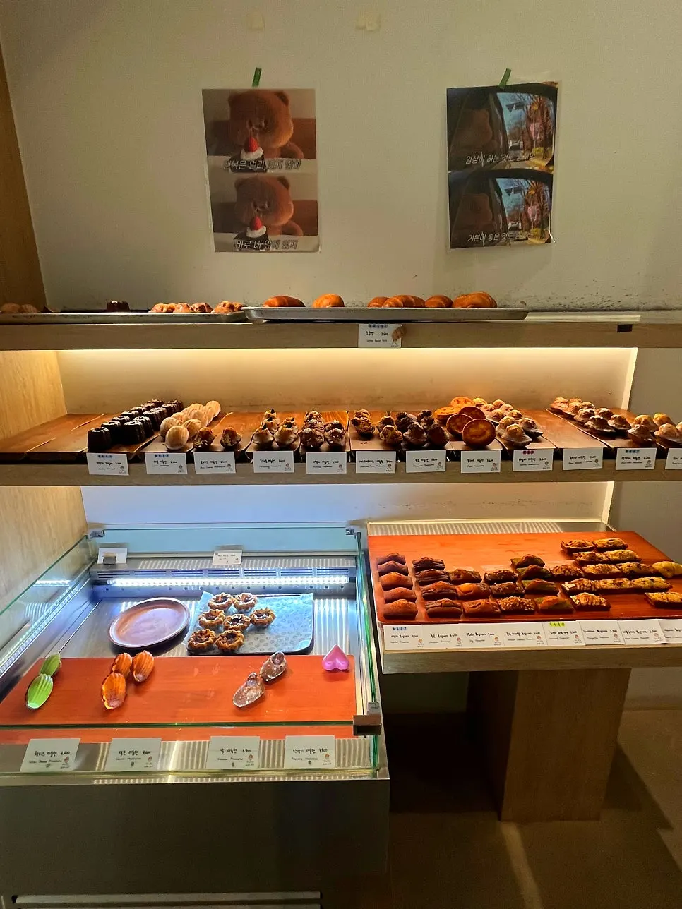 Interior of the bakery with wood-toned display shelves