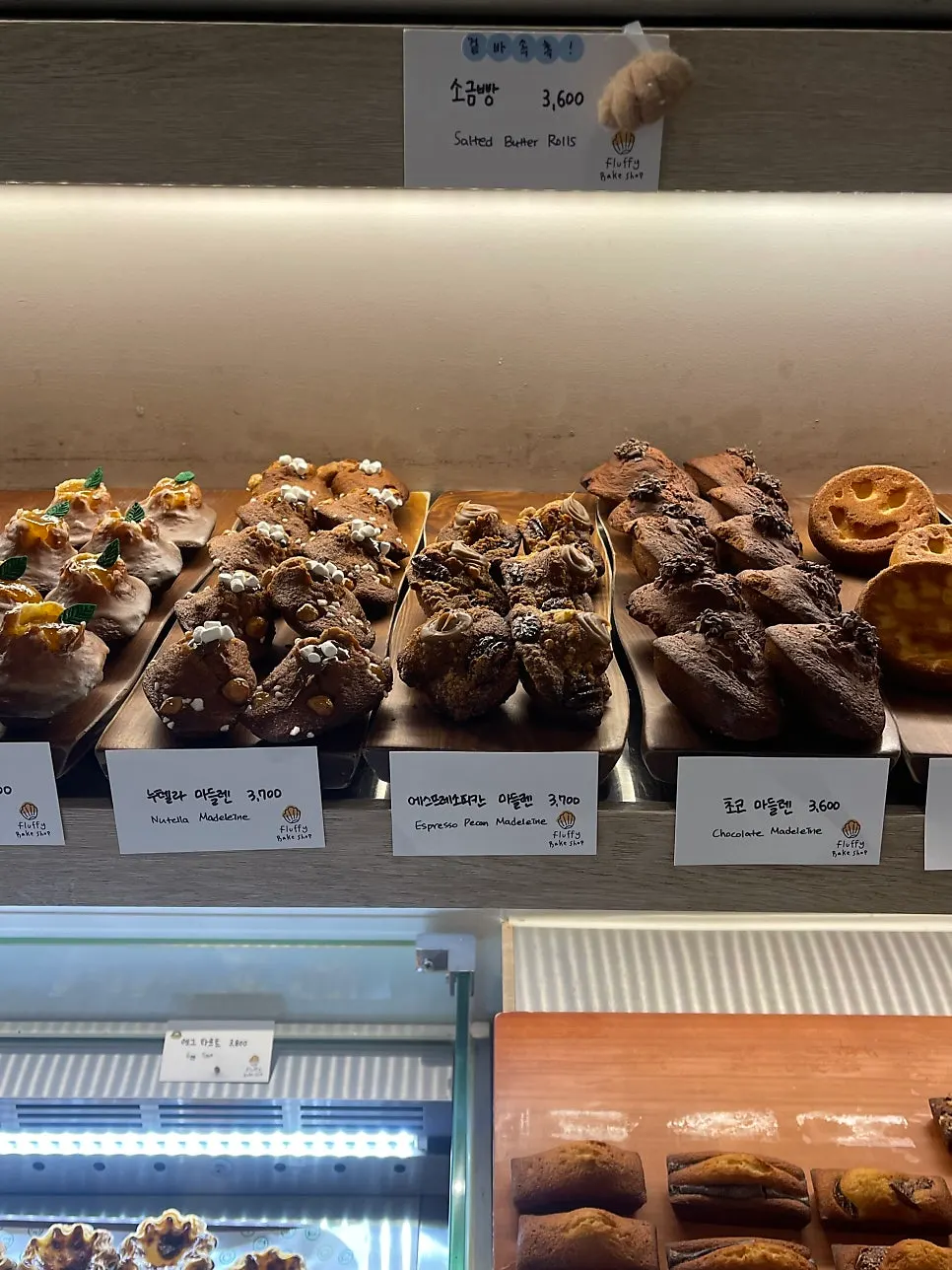 Dessert display case with madeleines