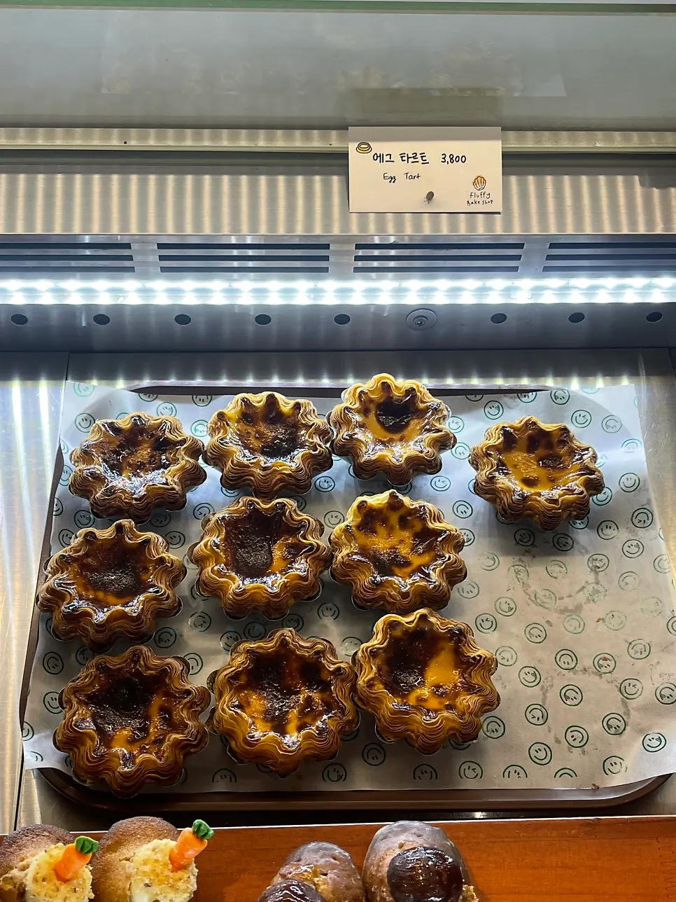 Assorted baked goods with price tags