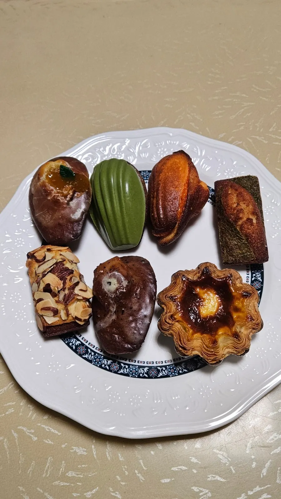 Seven pastries laid out at home
