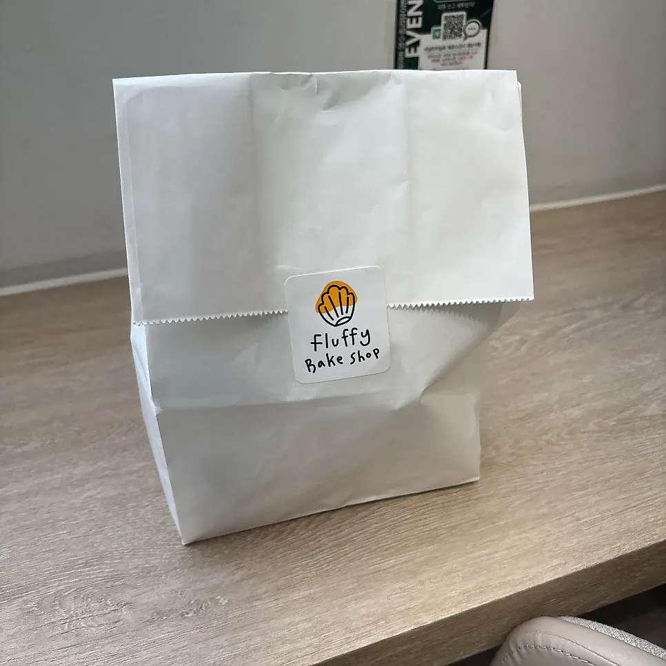 Paper bag with stickers on it