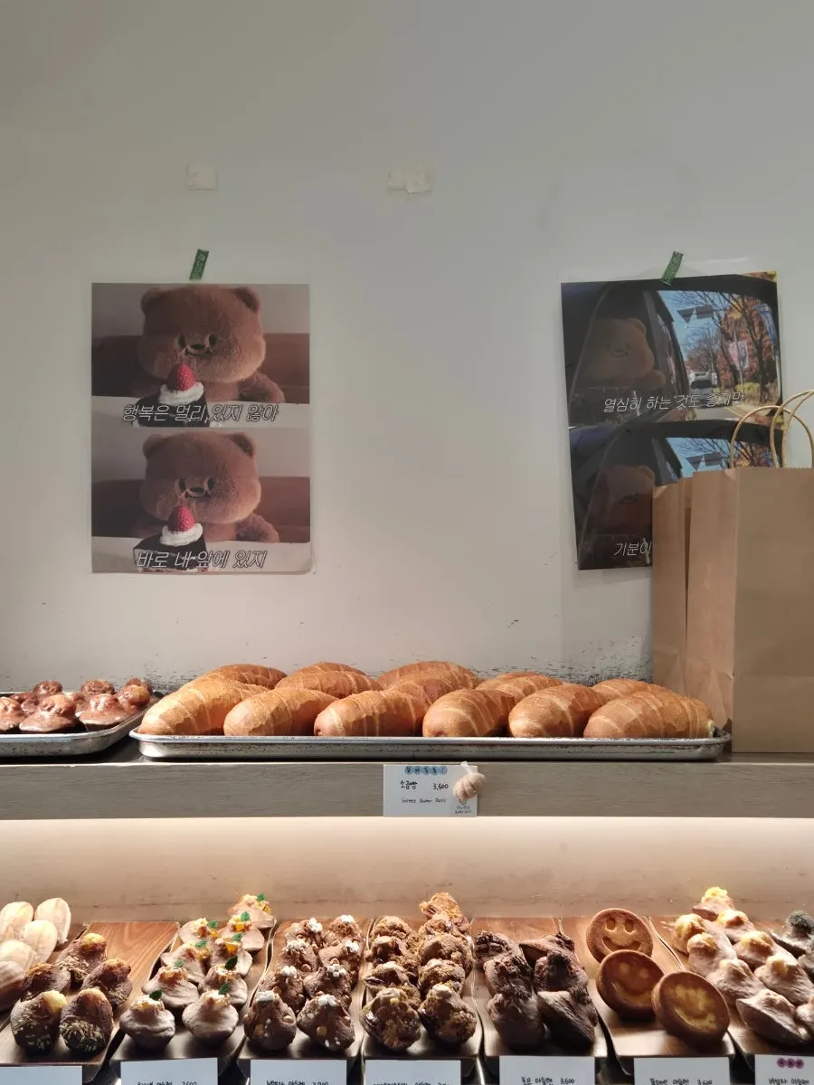 Salt bread and egg tarts on the display shelf