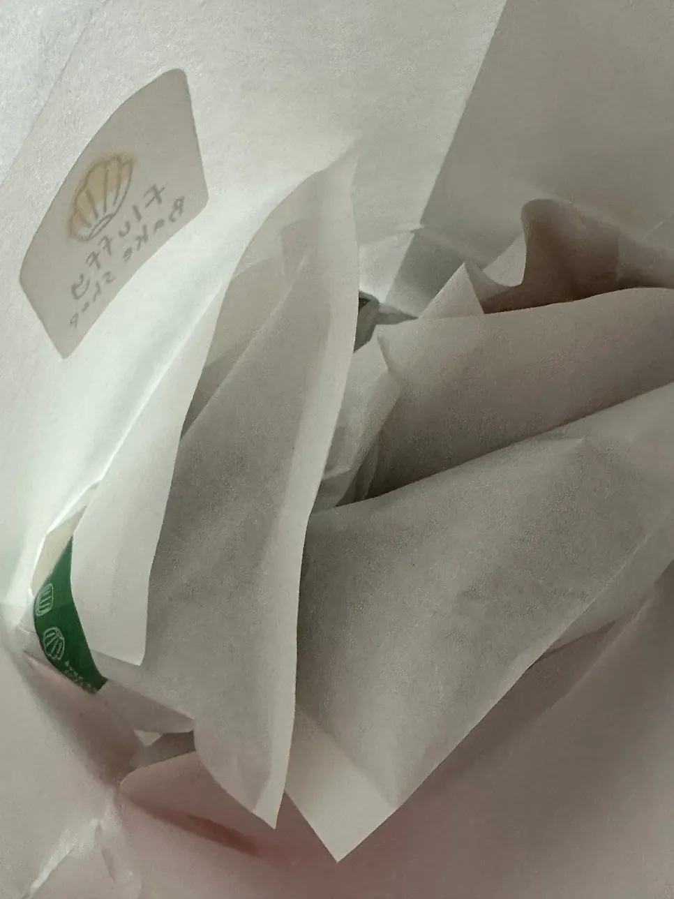 Pastries individually wrapped in paper