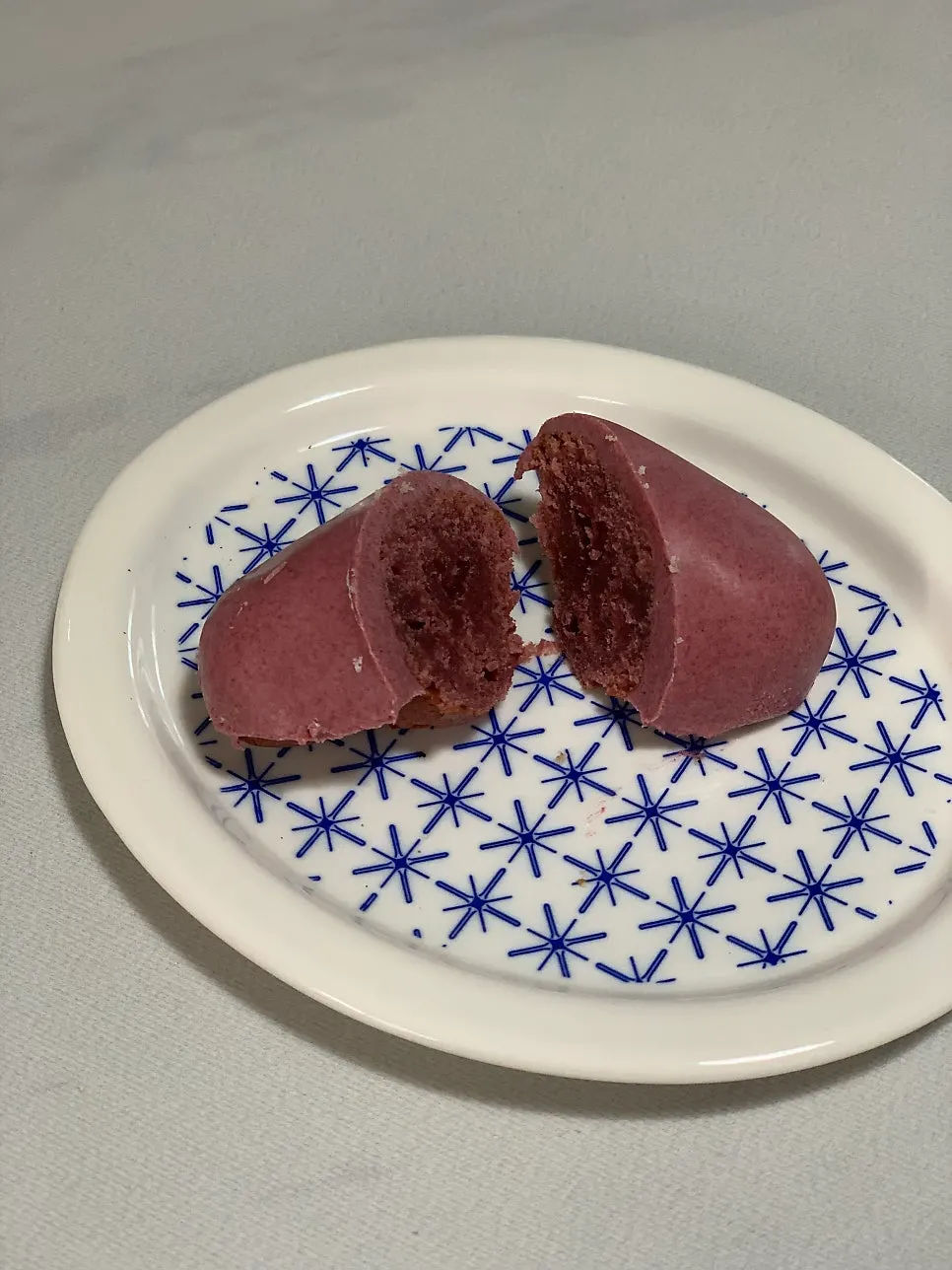 Moist, dense interior of the raspberry madeleine