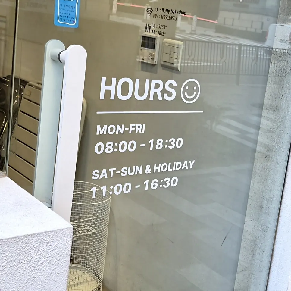 Fluffy Bake Shop hours of operation sign