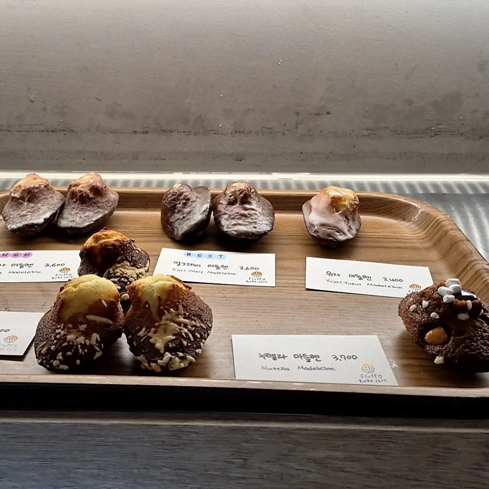 Display case with various madeleines