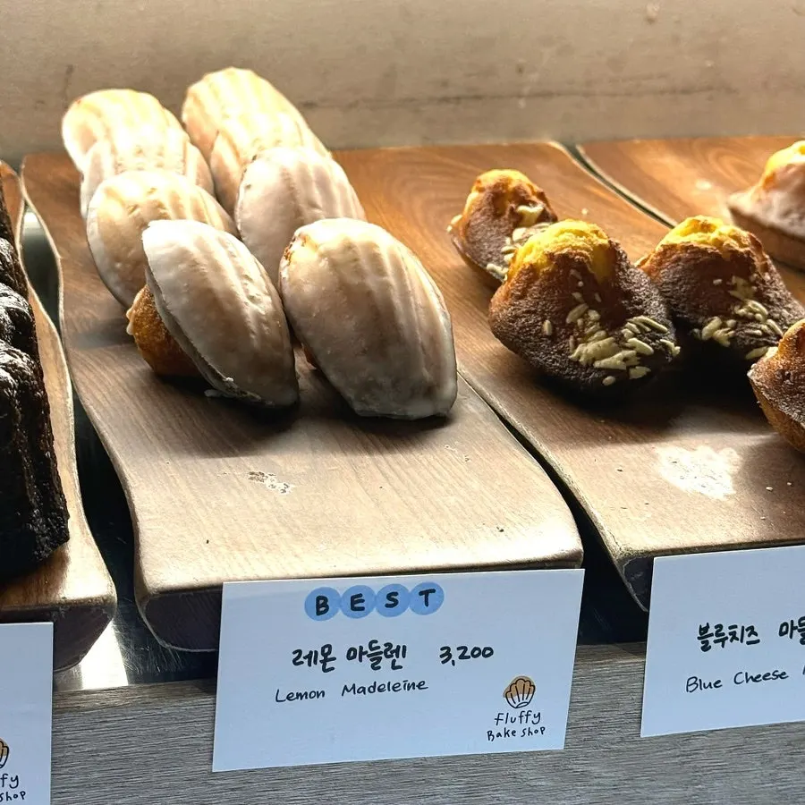 Matcha and yellow cheese madeleines displayed together