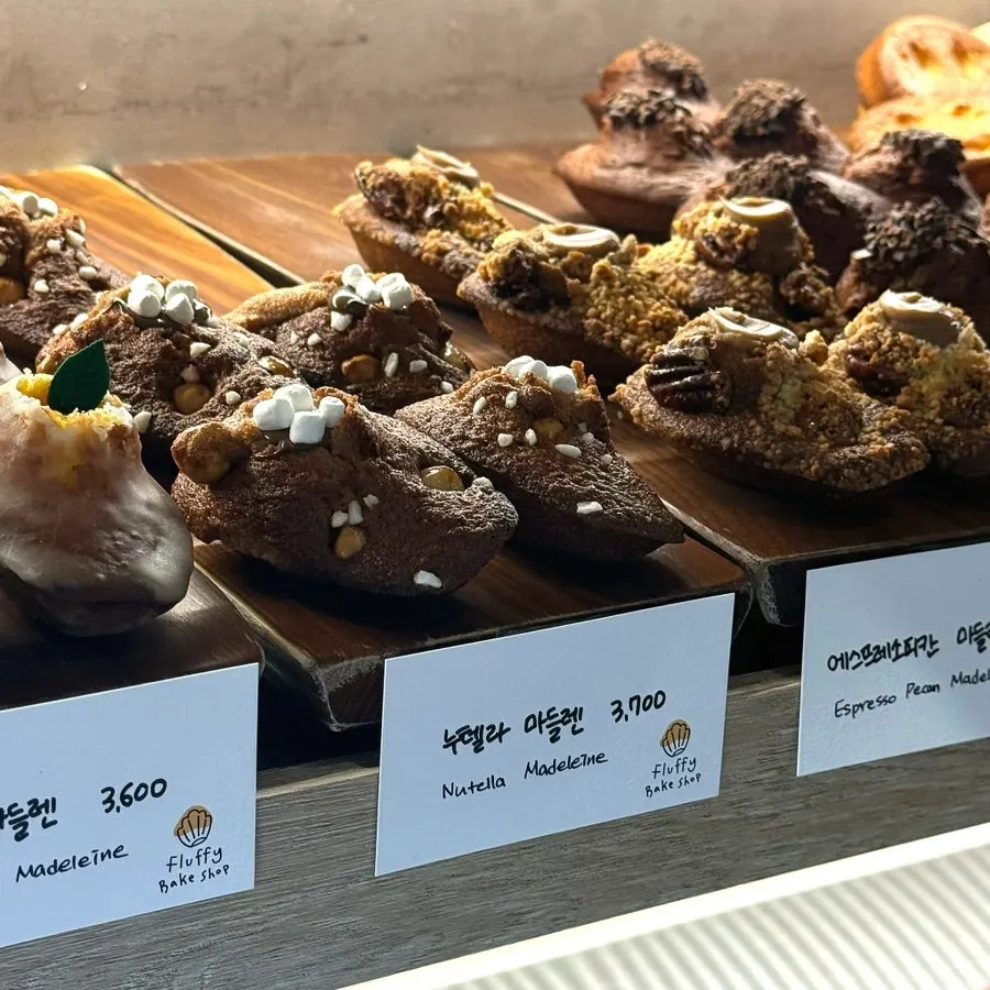 Close-up of various madeleine flavors lined up