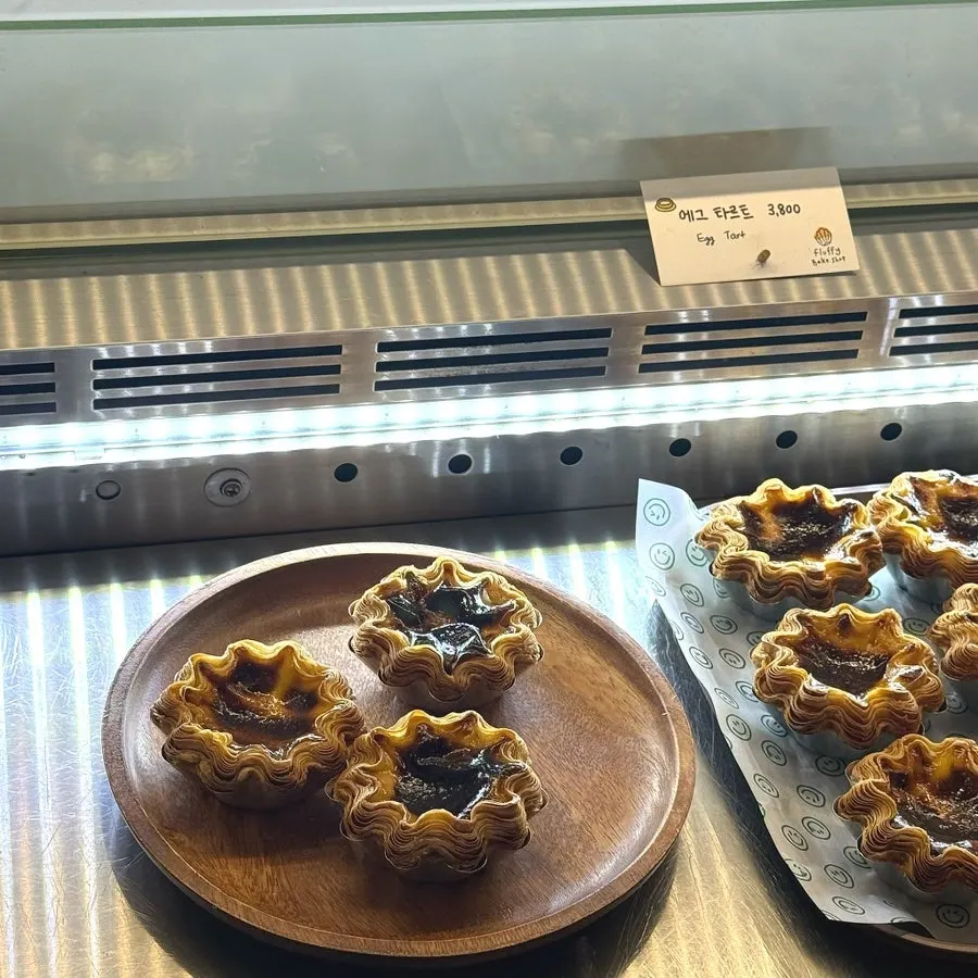 Egg tart with flaky, layered crust