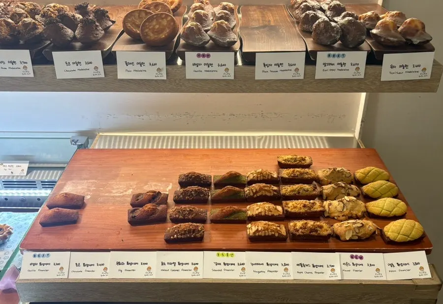 Display of canelés and other baked goods