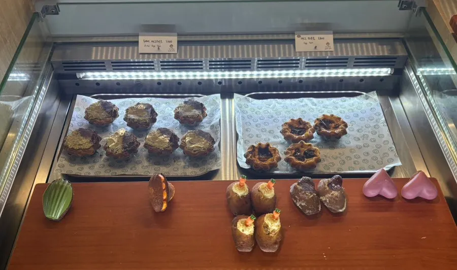 Baked goods menu with prices displayed