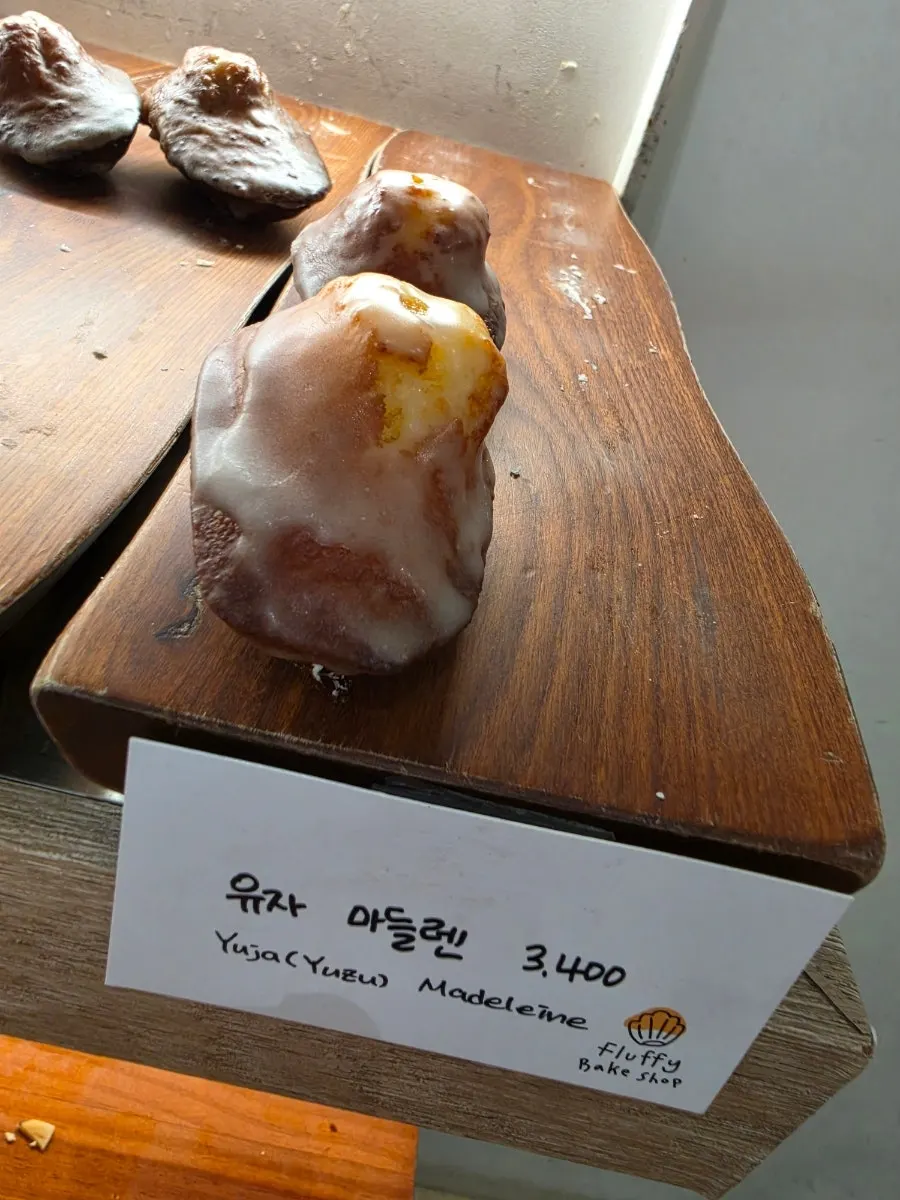 Canelés and egg tarts on display