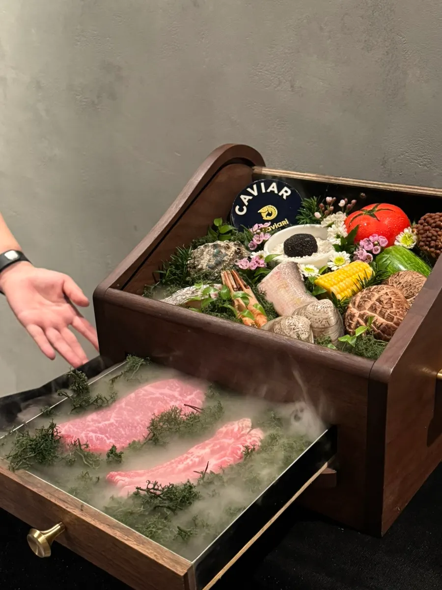Plate introducing ingredients such as Korean beef and caviar
