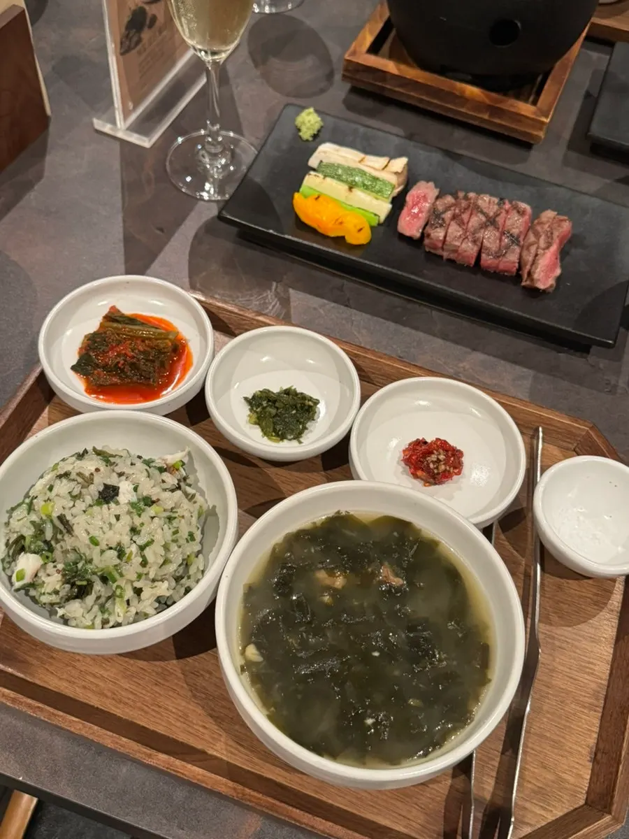 Herbs and abalone garnish on the gardenia noodles