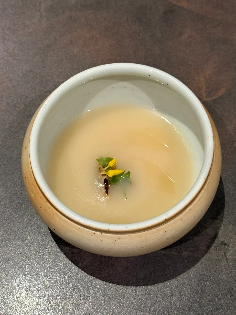 Jinjuk topped with nurungji and mushroom garnish