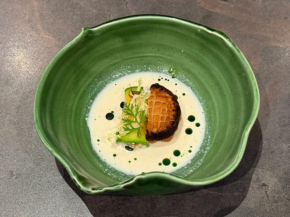 Plate of shiitake shrimp and zucchini dish