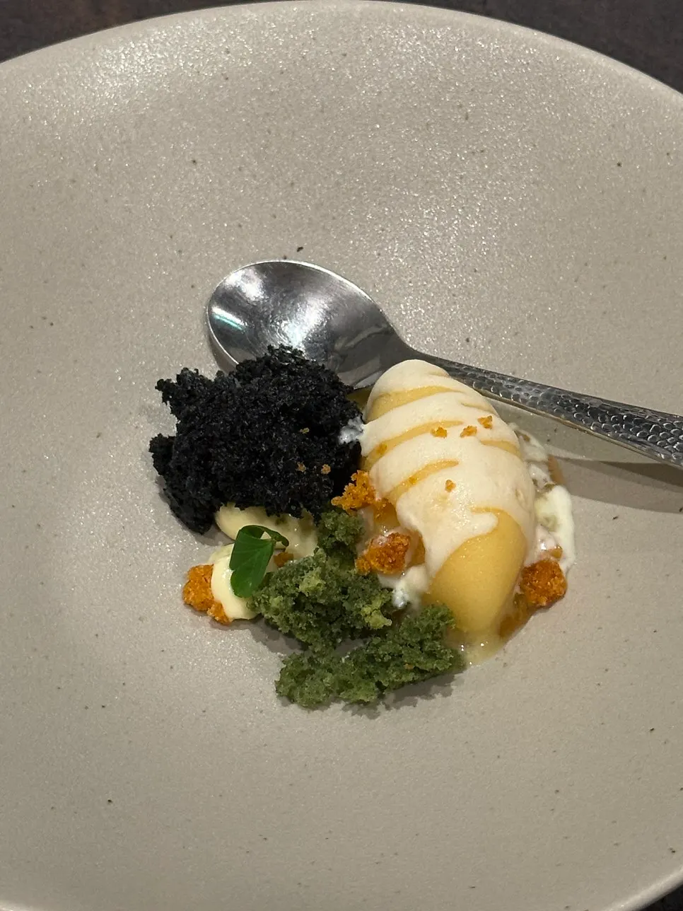 Close-up of corn ice cream and crumble dessert