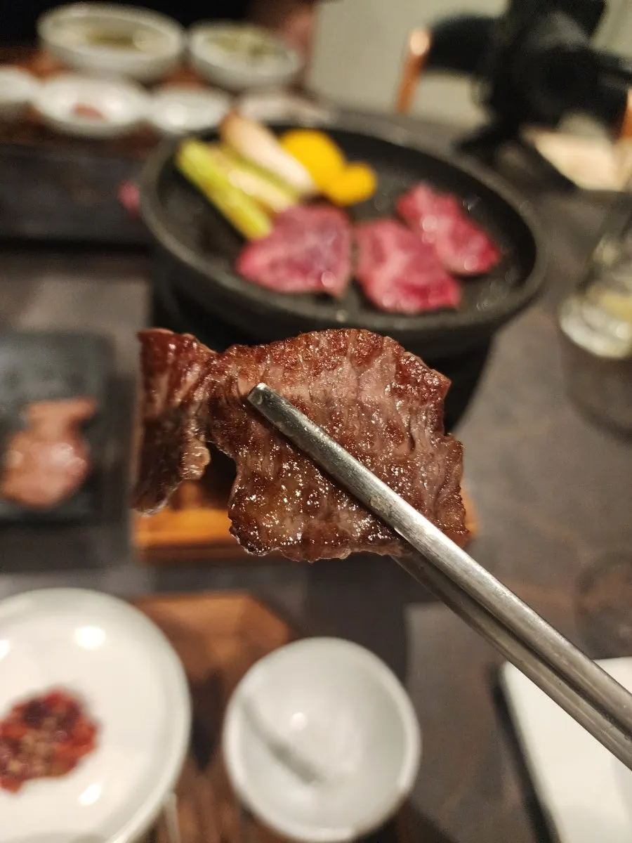 Hanwoo sirloin grilled on an individual charcoal grill