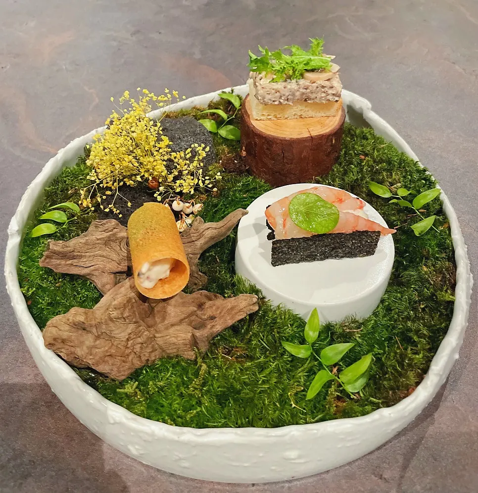 Plating of Usu's three bite-sized dishes