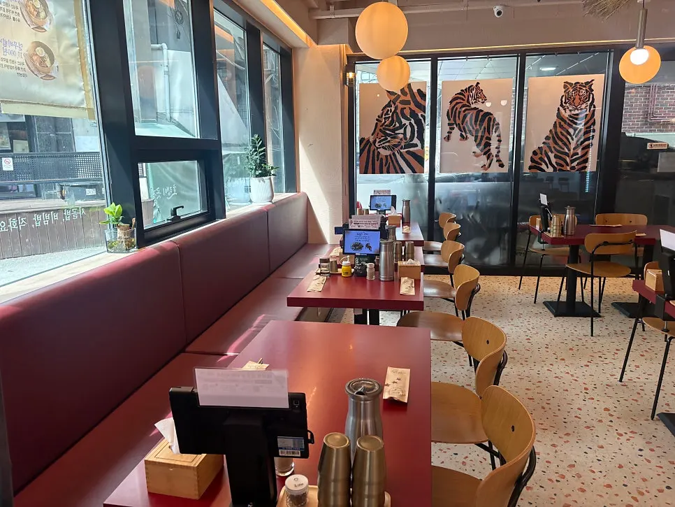 View of table seating at Horangi Gotgan Gongdeok Branch