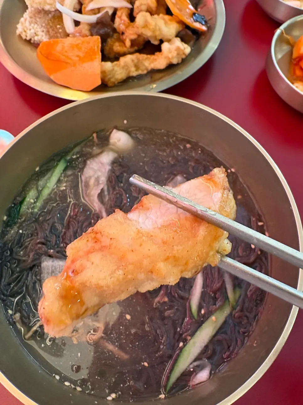 Close-up cross-section of nurungji tangsuyuk showing loin meat filling