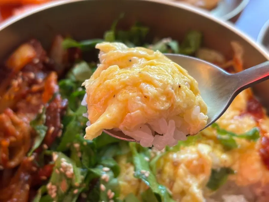 Pork bowl topped with a soft-boiled egg
