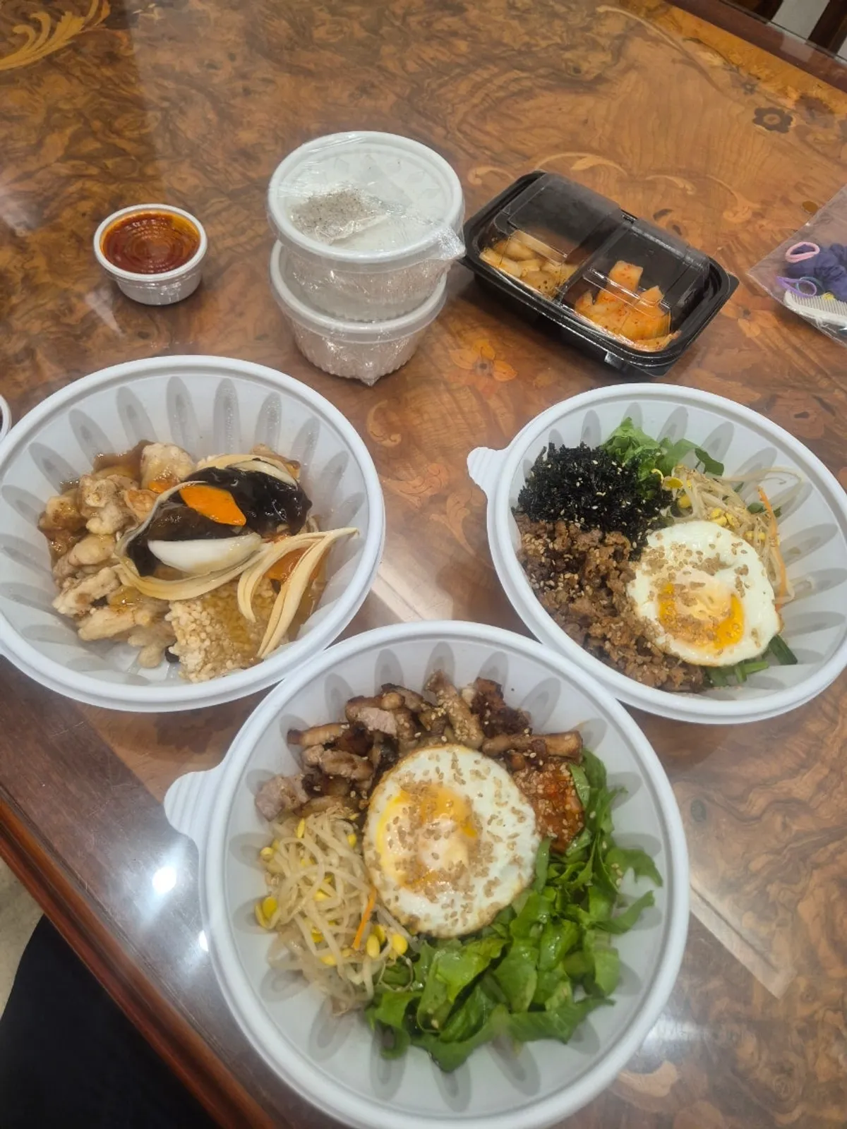 Takeout Korean meal from Horangi Gotgan laid out at home