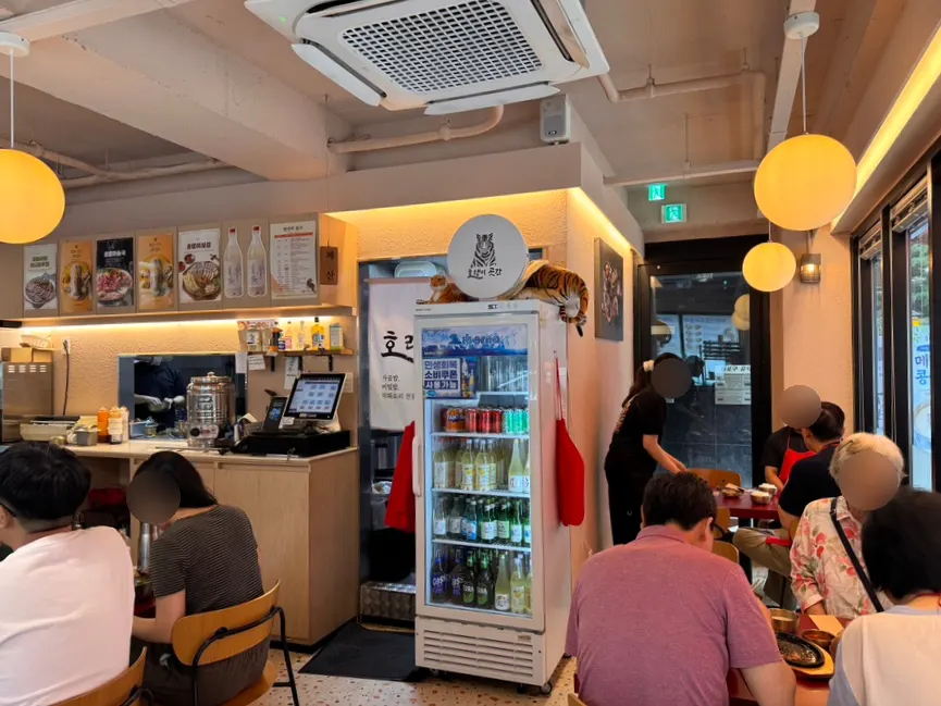 Restaurant interior with tiger character