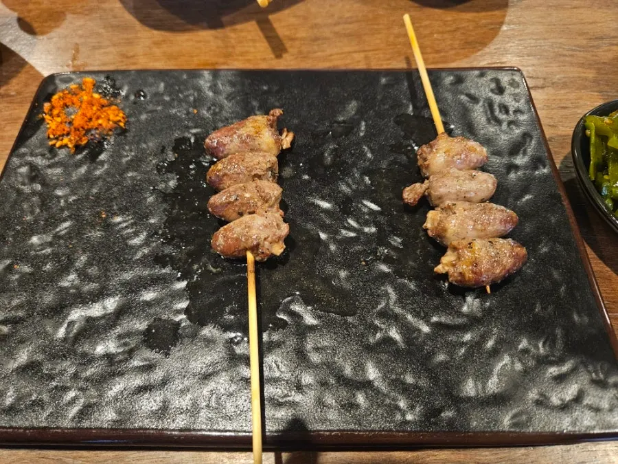 Tsukune skewer dipped in egg yolk