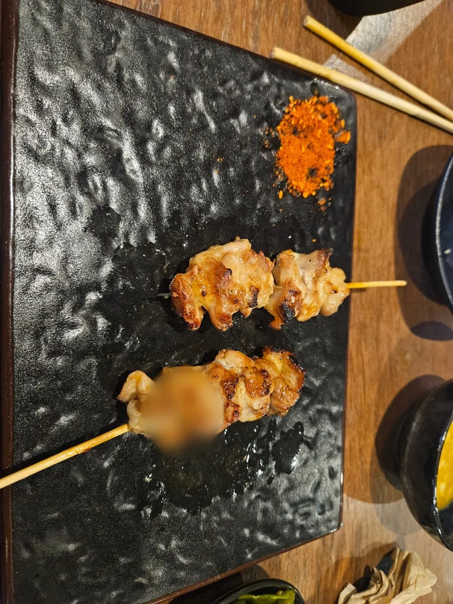 Golden-browned chicken wing skewer